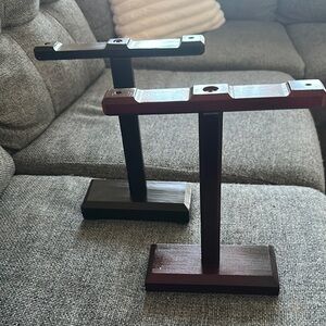 Black and Brown wood head set holders.